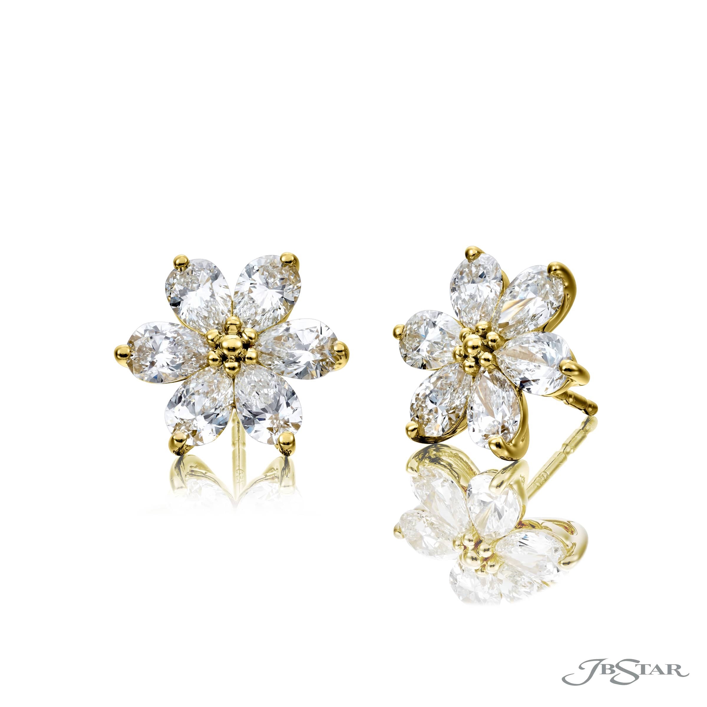 FLORAL DIAMOND STUD EARRINGS. THESE STUNNING PEAR-SHAPED DIAMONDS IN A BEAUTIFUL FLORAL DESIGN ARE HANDCRAFTED IN 18KY GOLD. 3.53CTW