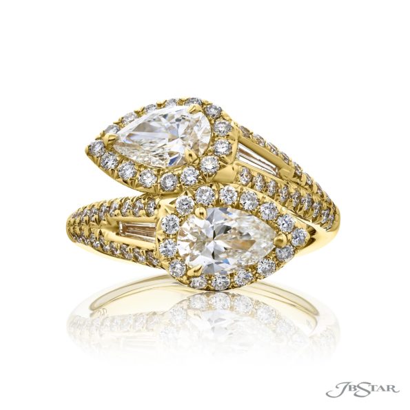 JB STAR'S SIGNATURE CERTIFIED TWOGETHER DIAMOND RING. THESE GIA CERTIFIED PEAR-SHAPED DIAMONDS ACCOMPANIED BY SHIMMERING TAPERED BAGUETTE AND MICRO PAVE DIAMONDS ARE HANDCRAFTED IN 18KY GOLD.