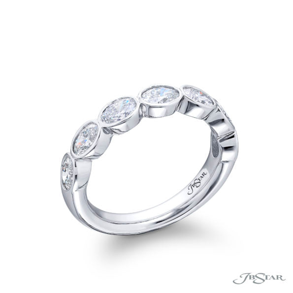 JB STAR'S SIGNATURE EAST-WEST BEZEL DIAMOND BAND. THESE SEVEN GORGEOUS OVAL DIAMONDS ARE HANDCRAFTED IN PURE PLATINUM.