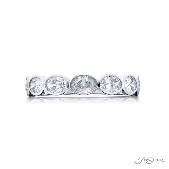 JB STAR'S SIGNATURE EAST-WEST BEZEL DIAMOND BAND. THESE SEVEN GORGEOUS OVAL DIAMONDS ARE HANDCRAFTED IN PURE PLATINUM.