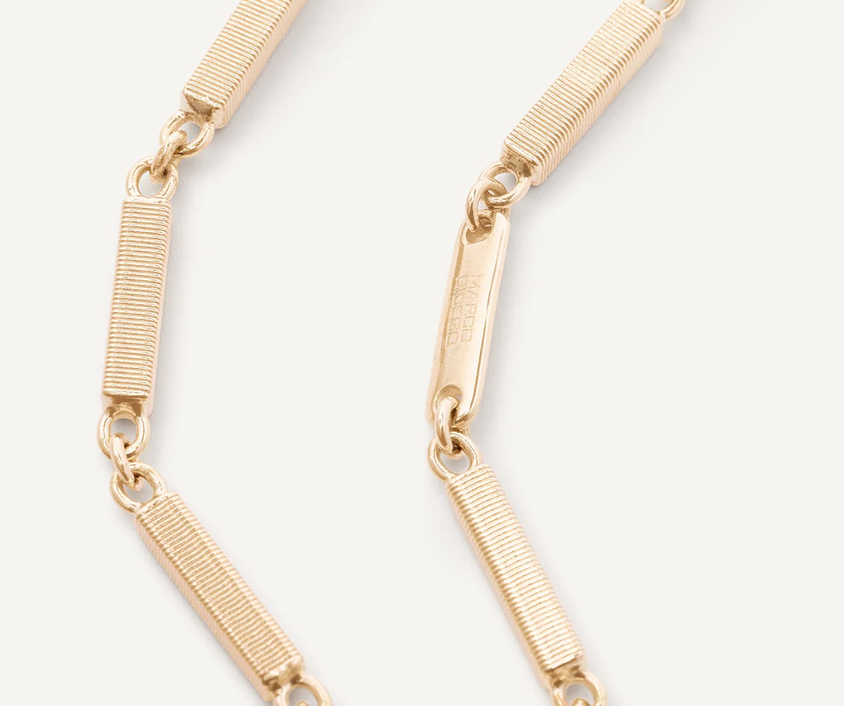 18K YELLOW GOLD COIL STATION WIDE LINK BRACELET