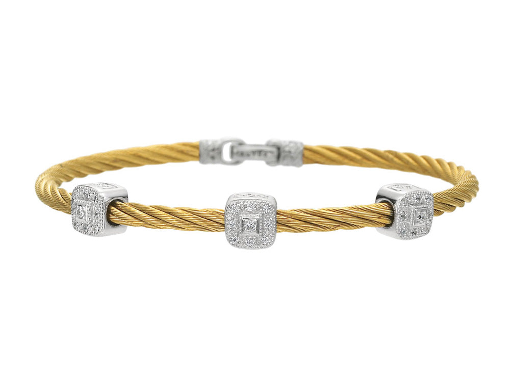 Alor 18 karat White Gold, stainless steel and yellow stainless steel cable 1 row 3.0 mm and Diamonds 0.14 total carat weight. Imported.