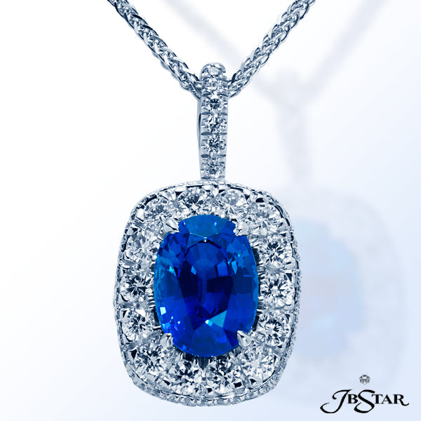 JB STAR ELEGANT HANDCRAFTED PLATINUM PENDANT FEATURES A 3.19CT OVAL SAPPHIRE CENTER EMBRACED WITH RO