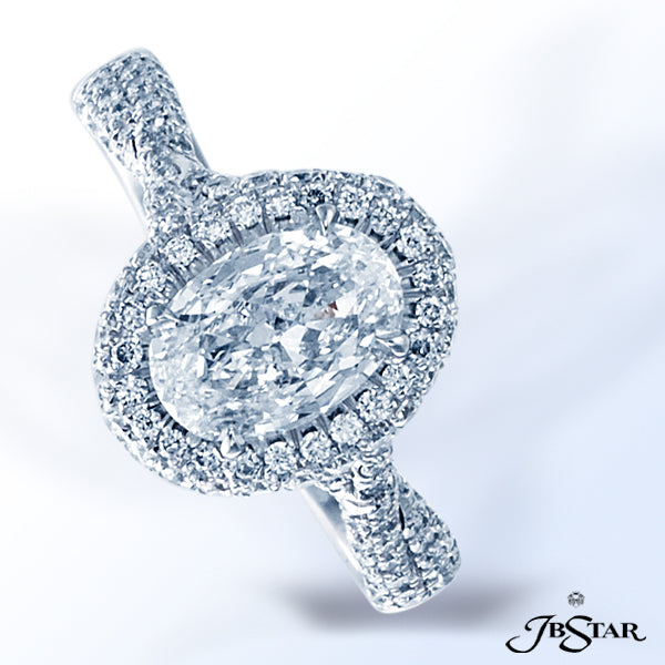 JB STAR DIAMOND ENGAGEMENT RING FEATURING A BEAUTIFUL 1.01 OVAL DIAMOND DISPLAYED IN A PAVE SETTING.