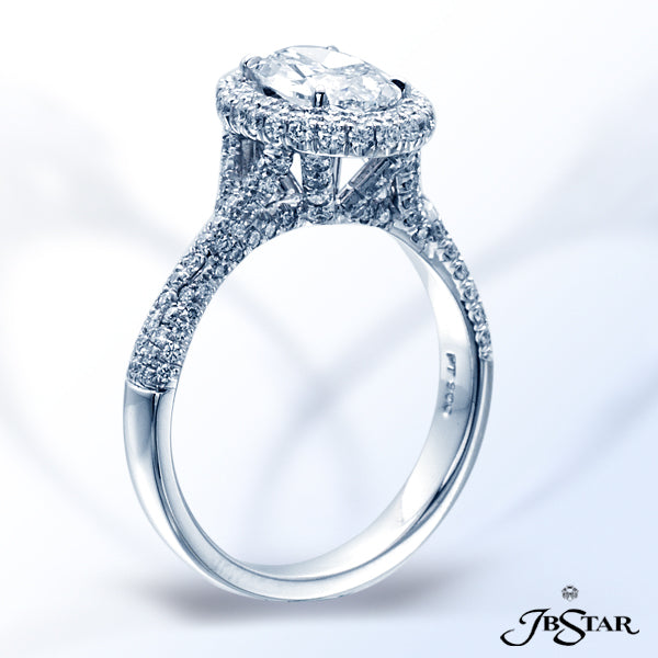 JB STAR DIAMOND ENGAGEMENT RING FEATURING A BEAUTIFUL 1.01 OVAL DIAMOND DISPLAYED IN A PAVE SETTING.