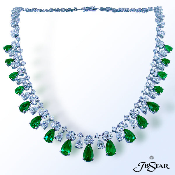 JB STAR EXQUISITE 16.57 CT. TW. PEAR SHAPE EMERALDS ELEGANTLY DANGLE FROM A SPARKLING STRAND OF 6.12