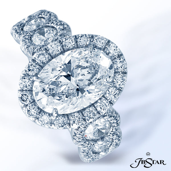 JB STAR DIAMOND ENGAGEMENT RING HANDCRAFTED WITH A BEAUTIFUL 3.04 CT OVAL DIAMOND ENHANCED BY ADDITI