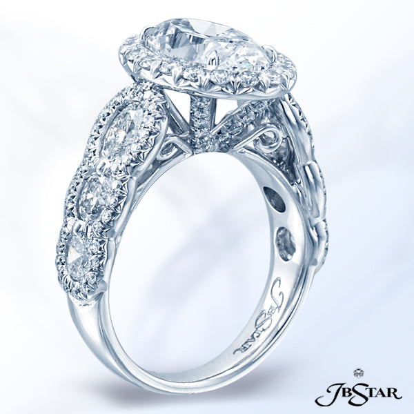 JB STAR DIAMOND ENGAGEMENT RING HANDCRAFTED WITH A BEAUTIFUL 3.04 CT OVAL DIAMOND ENHANCED BY ADDITI