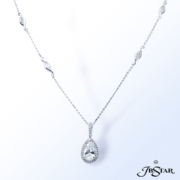 JB STAR PLATINUM DIAMOND PENDANTCENTER: PEAR SHAPE DIAMOND 2.29 CT. D SI1 GIADIAMONDS: 0.50 CT.