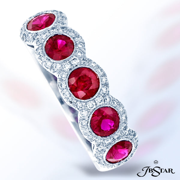 JB STAR THIS STUNNING PLATINUM RUBY AND DIAMOND BAND FEATURES 5 ROUND RUBIES EMBRACED WITH PAVE.DI