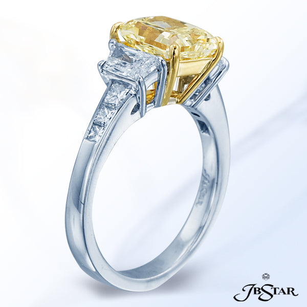 JB STAR FANCY YELLOW DIAMOND RING FEATURING A MAGNIFICENT 2.40CT RADIANT FY DIAMOND EMBRACED BY TRAP