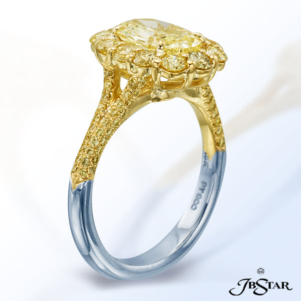 JB STAR NATURAL FANCY YELLOW DIAMOND RING FEATURING A MAGNIFICENT 1.50 CT OVAL FY DIAMOND SURROUNDED