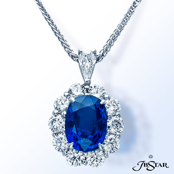 JB STAR STUNNING PENDANT FEATURING A 3.64CT OVAL SAPPHIRE CENTER ENCIRCLED WITH ROUND DIAMONDS. PLAT