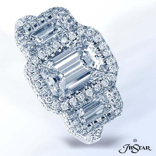 JB STAR DIAMOND ENGAGEMENT RING FEATURING A LOVELY 1.70 CT EMERALD-CUT DIAMOND EMBRACED BY ADDITIONA