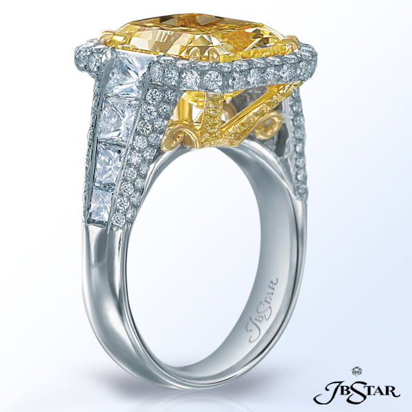 JB STAR THIS EXQUISITE FANCY YELLOW AND DIAMOND ENGAGEMENT RING IS HANDCRAFTED IN PLATINUM AND 18K Y