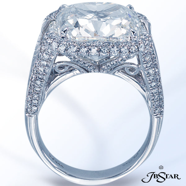 JB STAR THIS STUNNING PLATINUM ENGAGEMENT RING FEATURES A 10.69CT CUSHION DIAMOND ENHANCED WITH TRAP