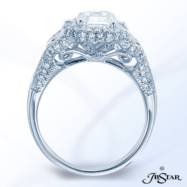 JB STAR PLATINUM DIAMOND RING FEATURING A STUNNING 2.43 CT EMERALD-CUT DIAMOND EMBRACED BY ADDITIONA