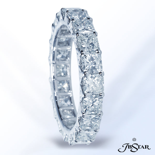 JB STAR THIS BEAUTIFUL PLATINUM AND DIAMOND ETERNITY FEATURES 20 RADIANT CUT DIAMONDS SET IN SHARED