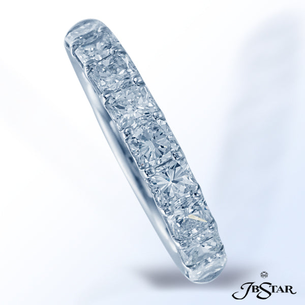 JB STAR PLATINUM BAND HANDCRAFTED WITH 9 PERFECTLY MATCHED RADIANT DIAMONDS IN SHARED-PRONG SETTING.