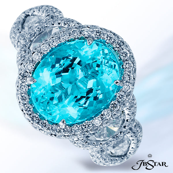 JB STAR PARAIBA AND DIAMOND RING FEATURING A BEAUTIFUL CERTIFIED 4.43 CT OVAL PARAIBA CENTER EMBRACE