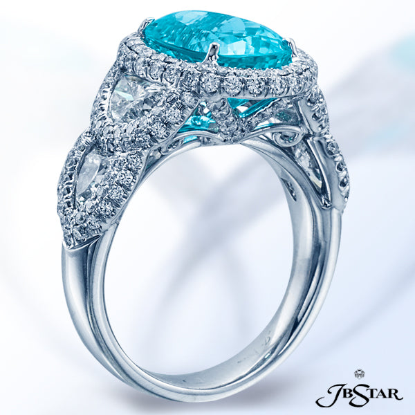 JB STAR PARAIBA AND DIAMOND RING FEATURING A BEAUTIFUL CERTIFIED 4.43 CT OVAL PARAIBA CENTER EMBRACE