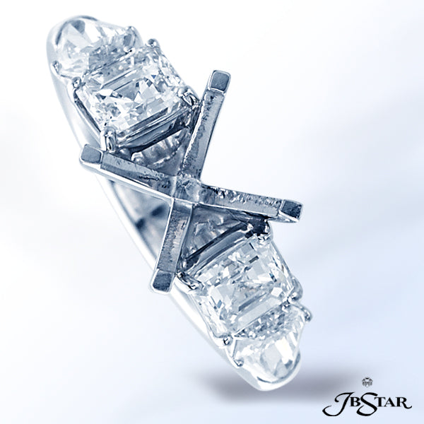 JB STAR ELEGANTLY STYLED THIS PLATINUM SEMI-MOUNT FEATURES PERFECTLY MATCHED SQUARE-EMERALD-CUT AND