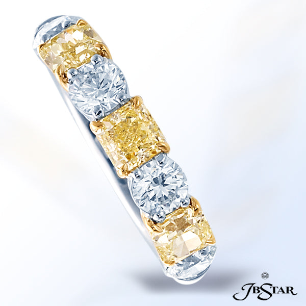 JB STAR MAGNIFICENTLY DESIGNED THIS PLATINUM AND 18K YELLOW GOLD BAND FEATURE ALTERNATING FANCY YELL